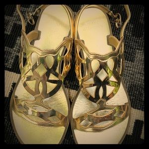 Gold Stuart Weitzman jelly sandals